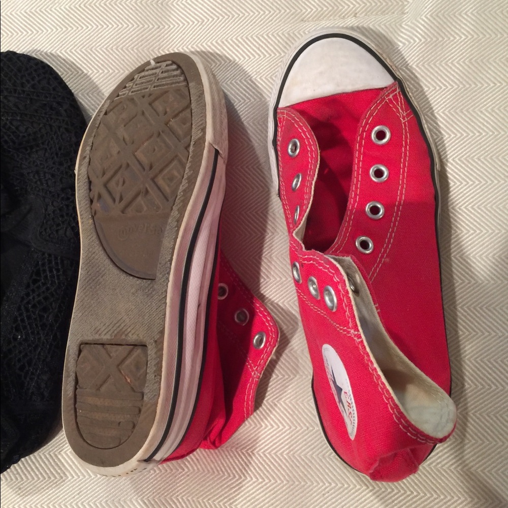 Red high top Chuck Taylor converse